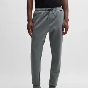 COTTON-BLEND TRACKSUIT BOTTOMS WITH DECORATIVE REFLECTIVE LOGO